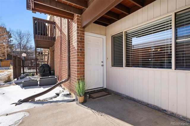 3663 S Sheridan Blvd Unit 2, Denver, CO 80235 - doorway to property with brick siding