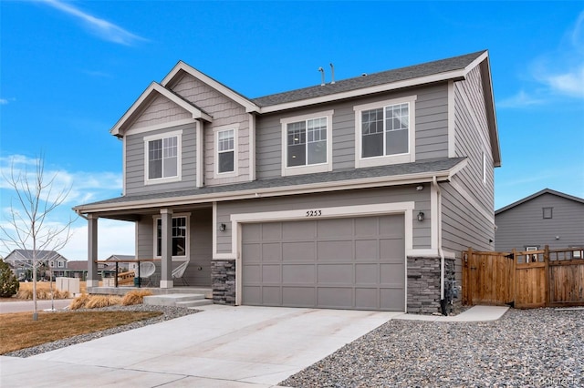 craftsman house featuring a garage and a porch