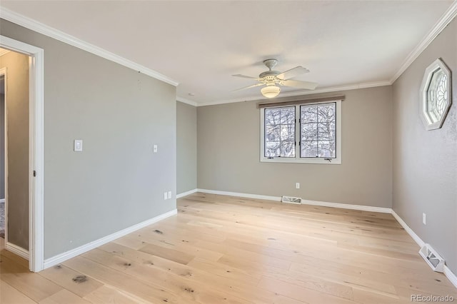 unfurnished room with visible vents, light wood-type flooring, a ceiling fan, and ornamental molding