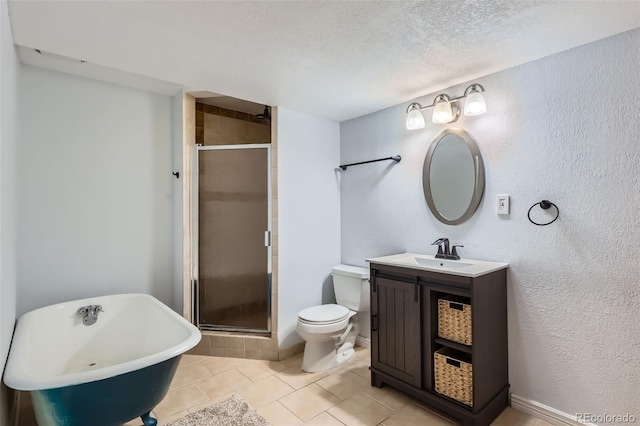 full bathroom with vanity, a stall shower, tile patterned flooring, a textured ceiling, and toilet