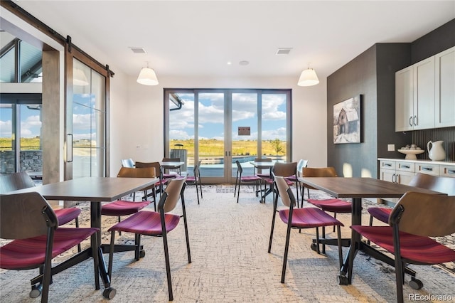 dining area featuring visible vents