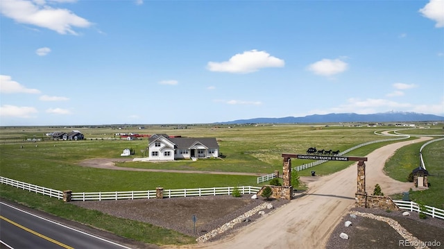 19751 Good Life Vw, Calhan, CO 80808 - aerial view of sparsely populated area with a pastoral area and a mountain backdrop
