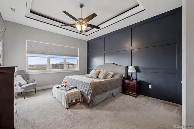 19751 Good Life Vw, Calhan, CO 80808 - bedroom with a raised ceiling, light carpet, and ceiling fan