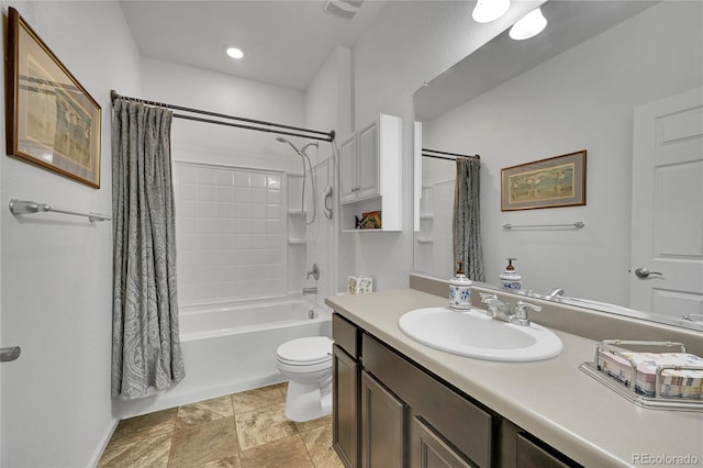 bathroom with toilet, shower / tub combo with curtain, and vanity