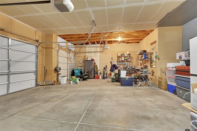 garage featuring a garage door opener