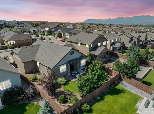 3326 Daydreamer Dr, Colorado Springs, CO 80908 - aerial view of residential area featuring a mountainous background