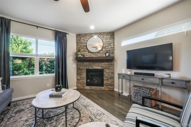 3326 Daydreamer Dr, Colorado Springs, CO 80908 - living area with ceiling fan, wood finished floors, and a fireplace