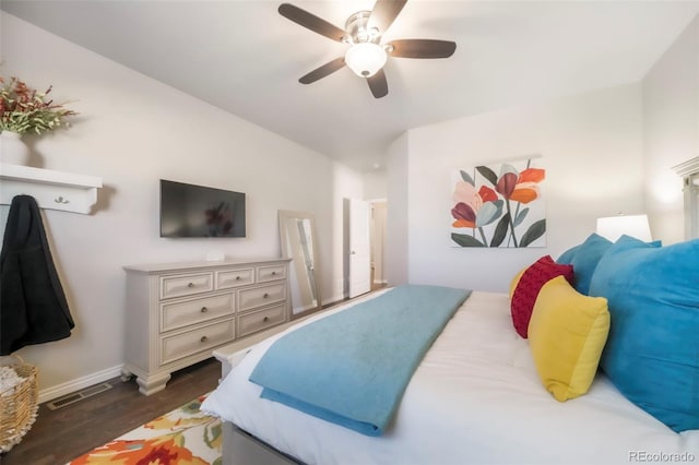 3326 Daydreamer Dr, Colorado Springs, CO 80908 - bedroom with dark wood-style floors, ceiling fan, and vaulted ceiling