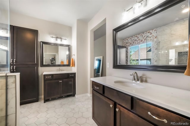 3326 Daydreamer Dr, Colorado Springs, CO 80908 - bathroom featuring two vanities and baseboards