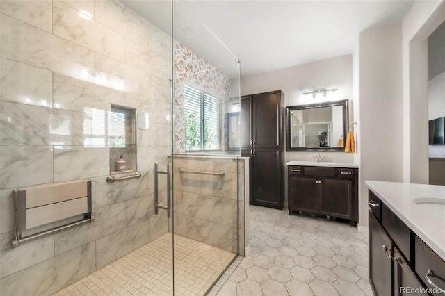 3326 Daydreamer Dr, Colorado Springs, CO 80908 - full bath with two vanities, a stall shower, and tile patterned flooring