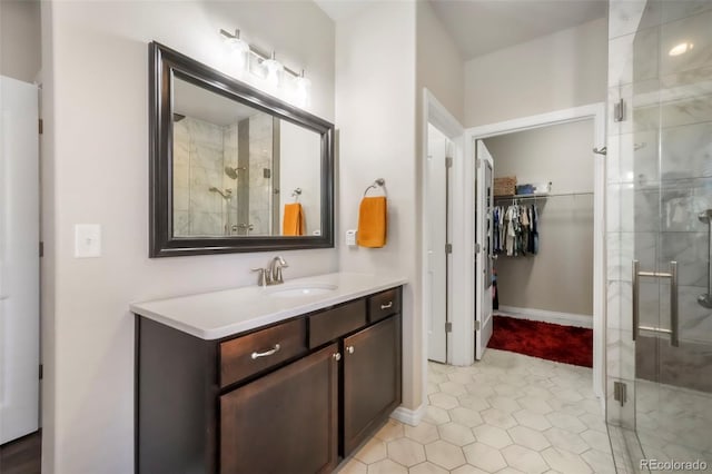 3326 Daydreamer Dr, Colorado Springs, CO 80908 - full bathroom featuring a shower stall, vanity, and a walk in closet