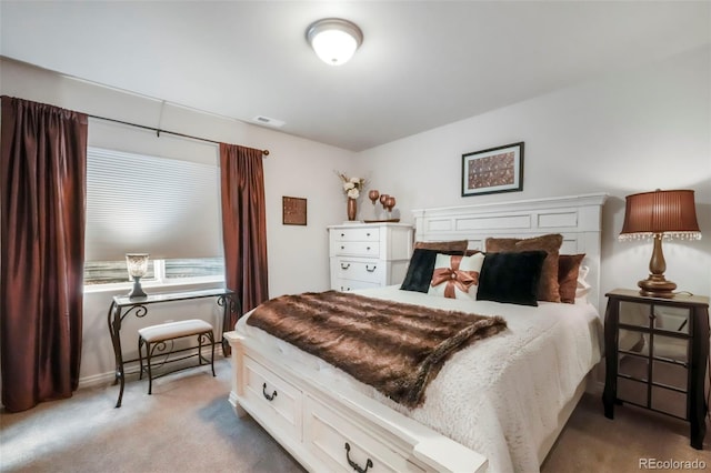 3326 Daydreamer Dr, Colorado Springs, CO 80908 - bedroom featuring light colored carpet