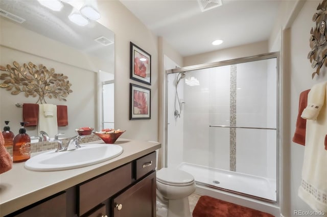 3326 Daydreamer Dr, Colorado Springs, CO 80908 - bathroom with vanity, a stall shower, and decorative backsplash
