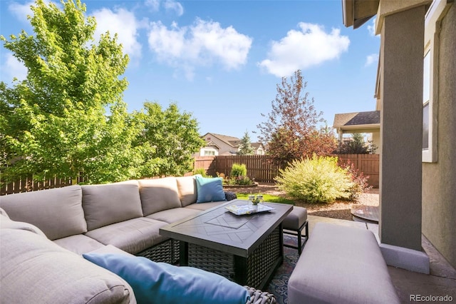 3326 Daydreamer Dr, Colorado Springs, CO 80908 - fenced backyard with outdoor lounge area and a patio