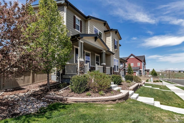 3429 Hardin St, Castle Rock, CO 80109 - view of property exterior with a porch and a yard