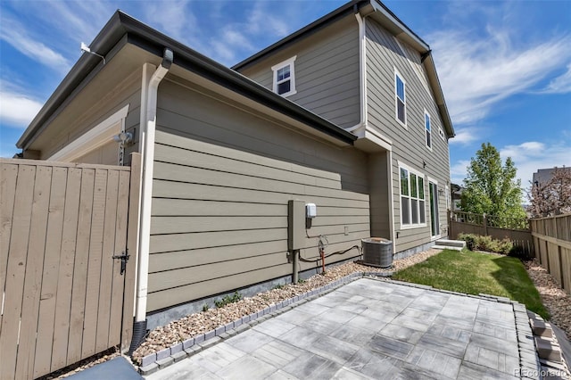 3429 Hardin St, Castle Rock, CO 80109 - view of home's exterior featuring a patio area and central AC unit