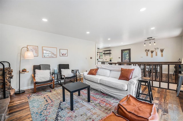 11557 Green Cir, Conifer, CO 80433 - living area featuring wood finished floors, recessed lighting, and baseboards