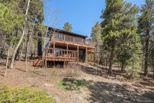 11557 Green Cir, Conifer, CO 80433 - rear view of house featuring a deck