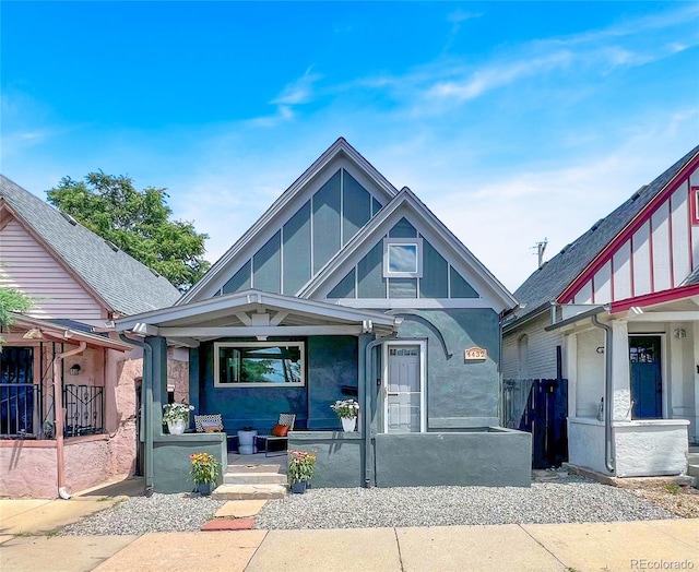 4432 Columbine St, Denver, CO 80216 - view of front of property featuring covered porch and stucco siding
