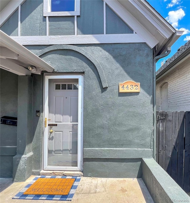 4432 Columbine St, Denver, CO 80216 - property entrance with stucco siding