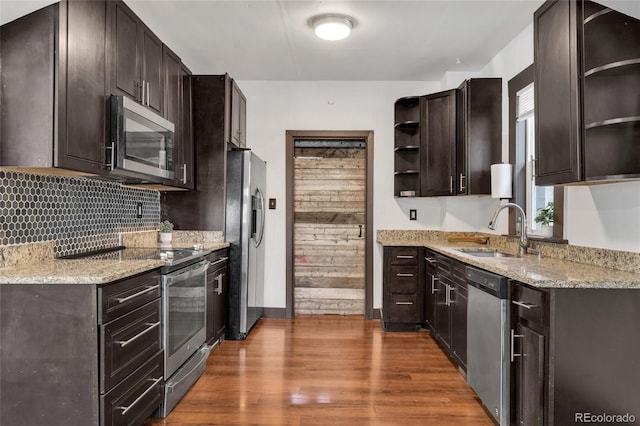 4432 Columbine St, Denver, CO 80216 - kitchen featuring open shelves, stainless steel appliances, dark brown cabinetry, and dark wood finished floors