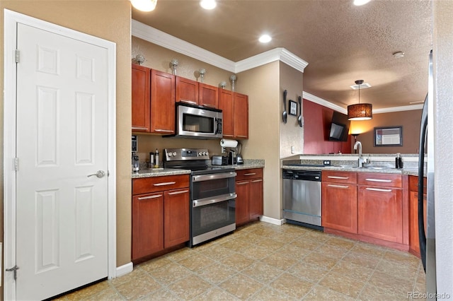 kitchen featuring ornamental molding, stainless steel appliances, hanging light fixtures, and a sink
