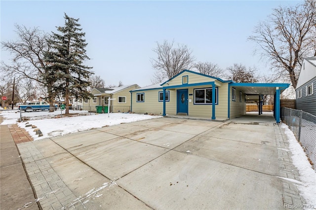 view of front of home featuring a carport