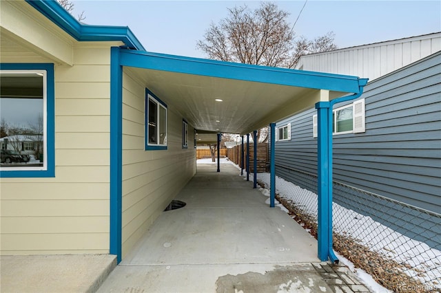 view of property exterior featuring a carport