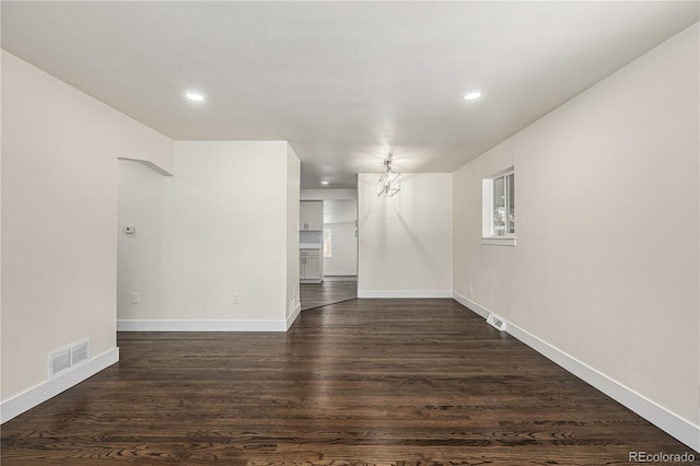 empty room featuring dark hardwood / wood-style floors