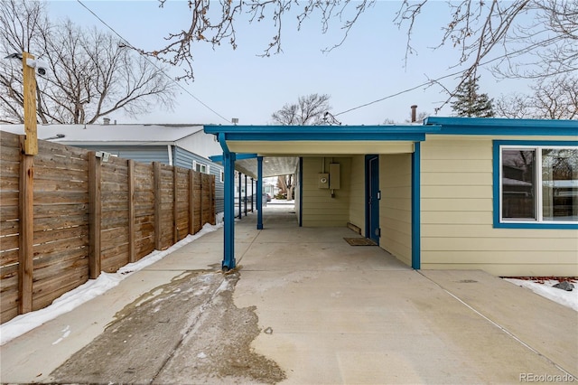 exterior space featuring a carport