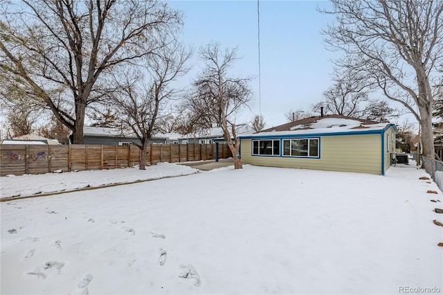 view of snow covered property