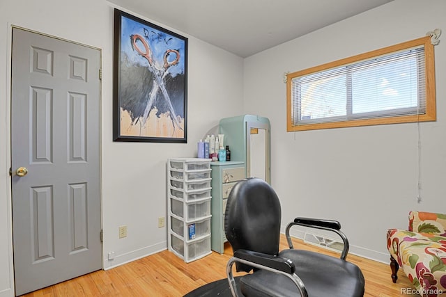 office space with hardwood / wood-style floors