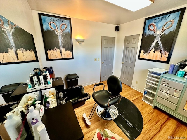 office area with wood finished floors and baseboards