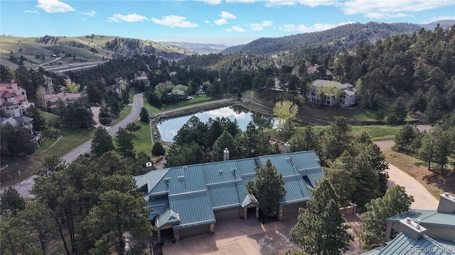 bird's eye view of a water and mountain view