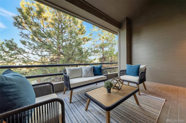 wooden terrace with outdoor lounge area