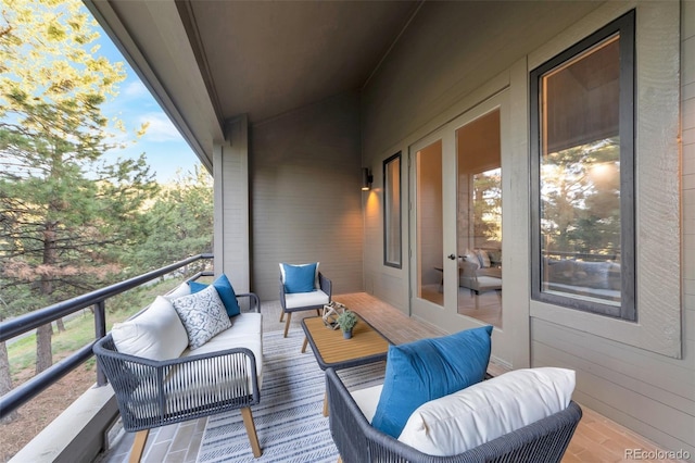 wooden deck featuring an outdoor hangout area