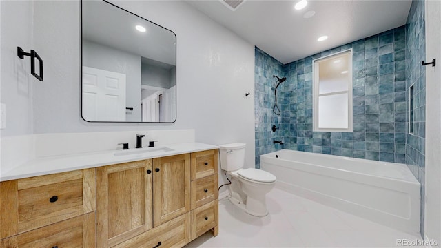 full bathroom with vanity, washtub / shower combination, toilet, and recessed lighting