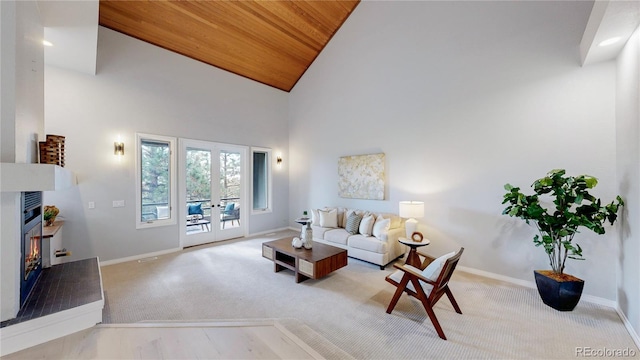 867 Hill And Dale Rd Unit B, Golden, CO 80401 - carpeted living room featuring a lit fireplace, high vaulted ceiling, recessed lighting, and wood ceiling