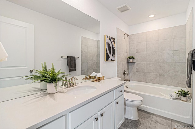 1953 Morgan Dr, Erie, CO 80516 - full bathroom with toilet, vanity, and shower / washtub combination