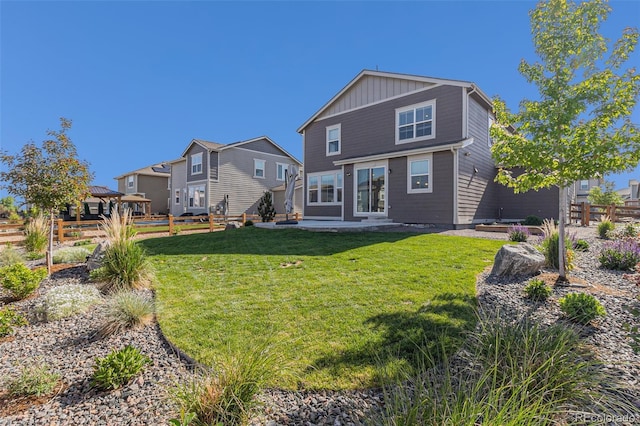 1953 Morgan Dr, Erie, CO 80516 - rear view of property featuring a gazebo and board and batten siding