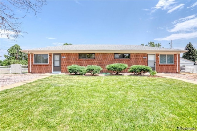 ranch-style house with a front yard