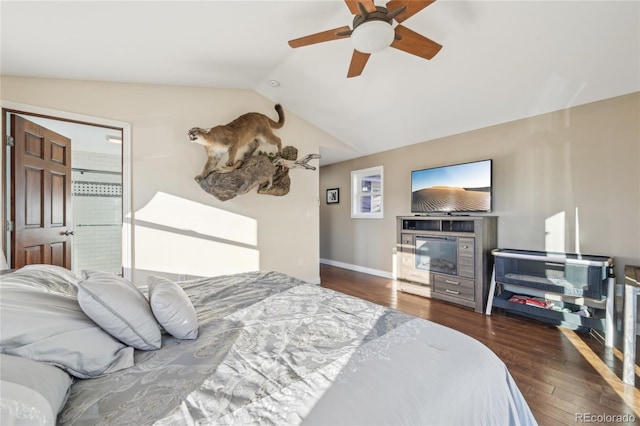 bedroom with vaulted ceiling, ceiling fan, and dark hardwood / wood-style flooring