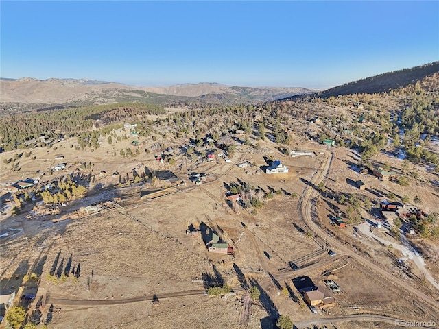 bird's eye view with a mountain view