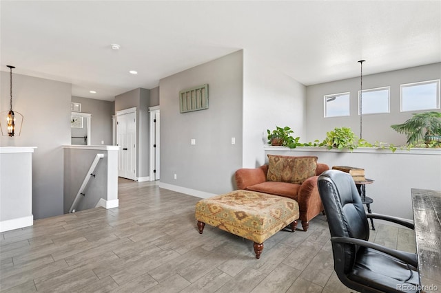 home office with recessed lighting, baseboards, and wood finished floors