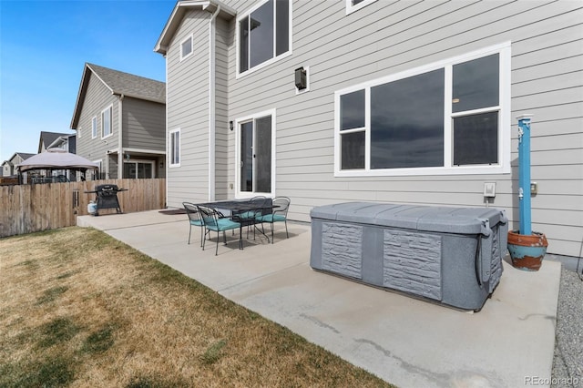 view of patio / terrace featuring fence