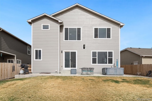 back of house featuring fence, a lawn, central AC unit, entry steps, and a patio area