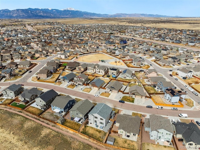 birds eye view of property featuring a residential view and a mountain view