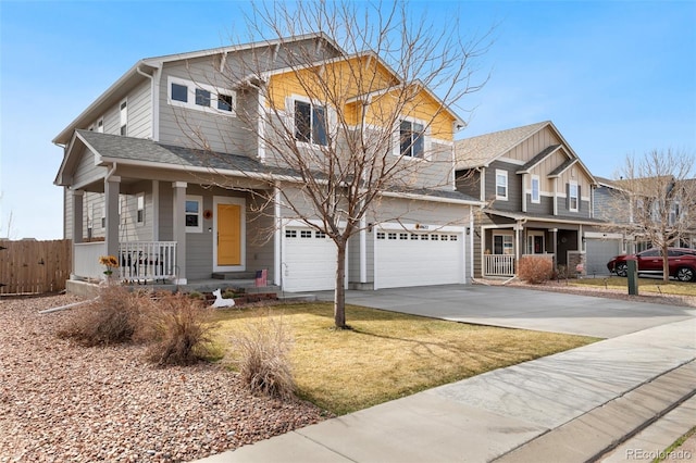 view of front of home featuring covered porch, concrete driveway, fence, a shingled roof, and a garage