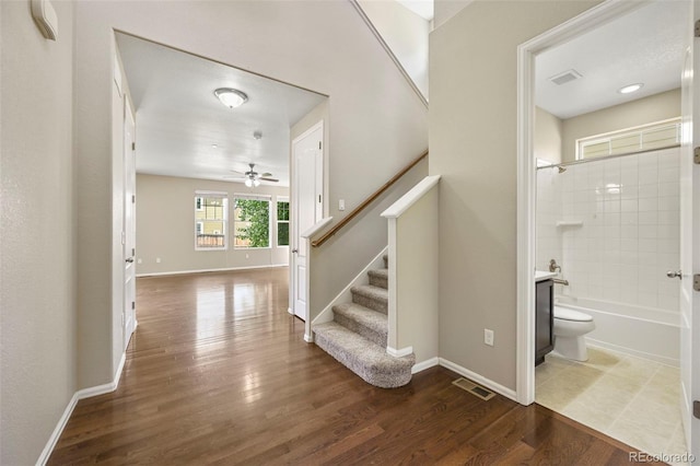 19659 W 59th Dr, Golden, CO 80403 - stairway with wood finished floors and ceiling fan