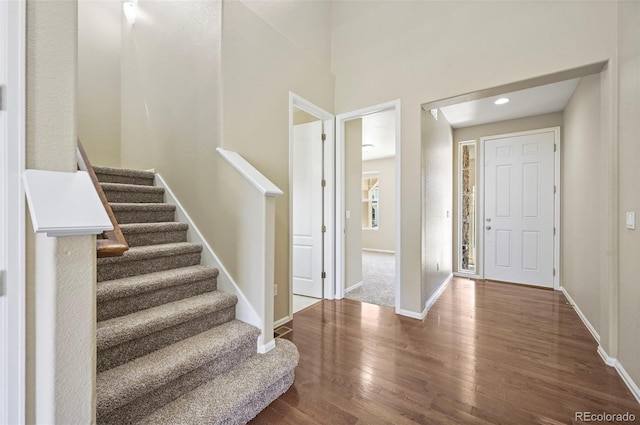 19659 W 59th Dr, Golden, CO 80403 - foyer with wood finished floors, stairway, and recessed lighting